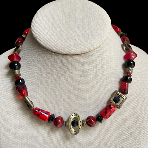 Chico’s glass beaded necklace in red and black with antiqued brass tone accents